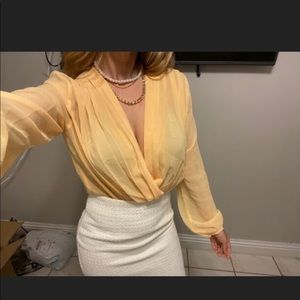 Large yellow body suit